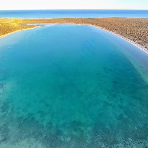 A curve of turquoise water, Western Australia