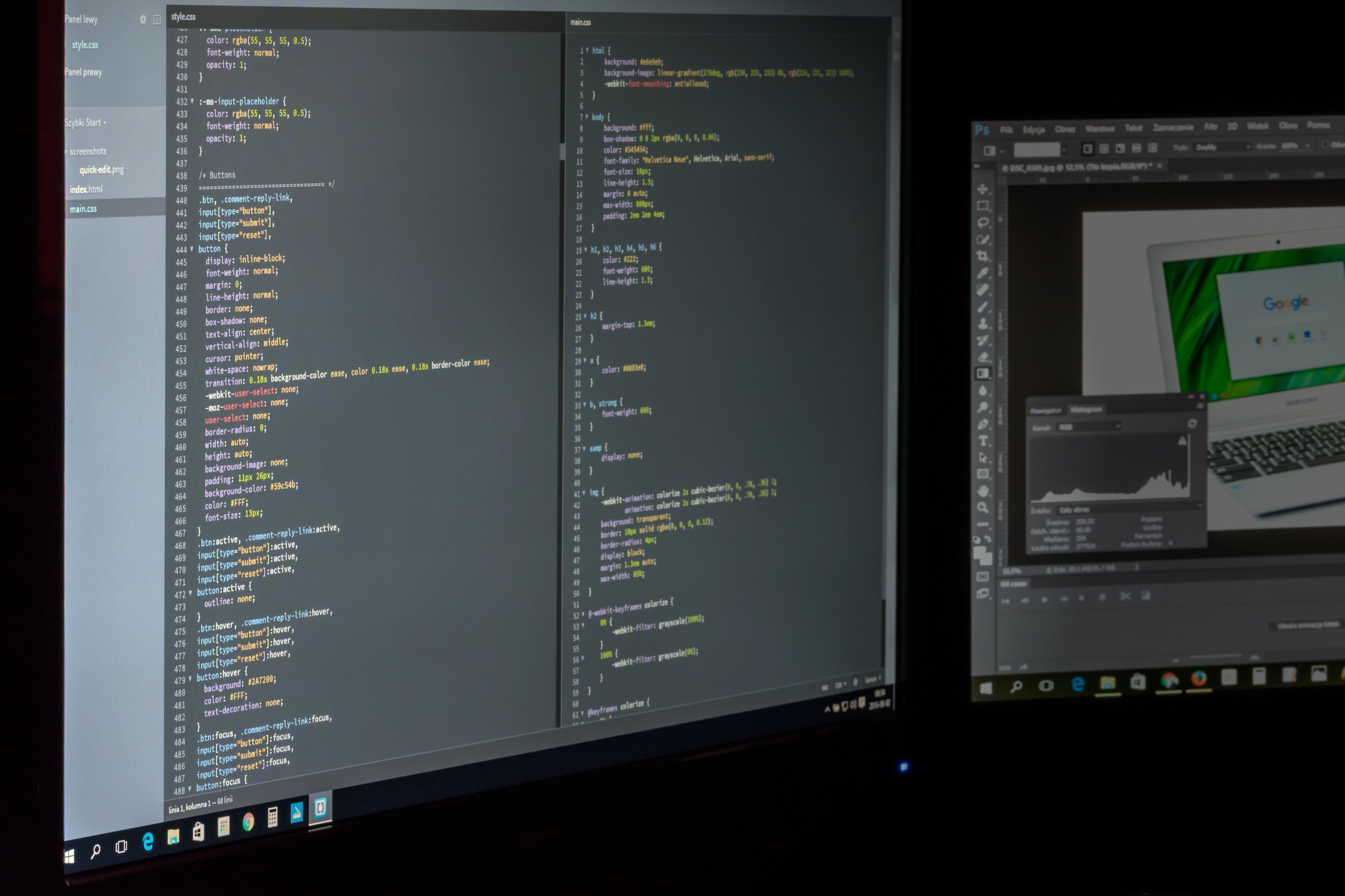 Two computer monitors displaying source code and image-editing software